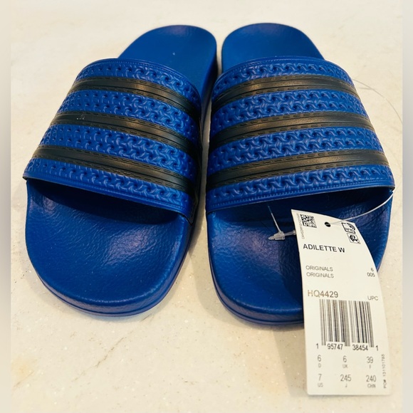 New with tags Adidas Adilette blue and black slides. Size 7 USA women’s - Picture 3 of 8